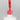 Nahaufnahme einer offenen Longlife UV-Lack Neon Cyclam Flasche. Die Farbe ist ein knalliges Pink mit Rot-Stich mit hoher Sättigung. Der UV-Lack tropft am Pinsel herunter.