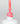Nahaufnahme einer offenen Longlife UV-Lack Neon Pink Flasche. Die Farbe ist ein knalliges Pink mit hoher Sättigung. Der UV-Lack tropft am Pinsel herunter.